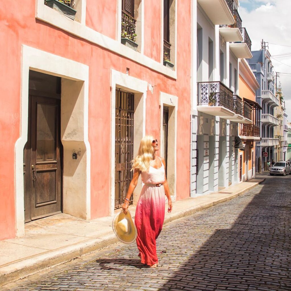 Couple enjoying Bucketlist Tours’ Ageless Elegance, Heritage, and Spirits private tour, exploring America's oldest churches and learning about the history of faith and sacred relics in Old San Juan.