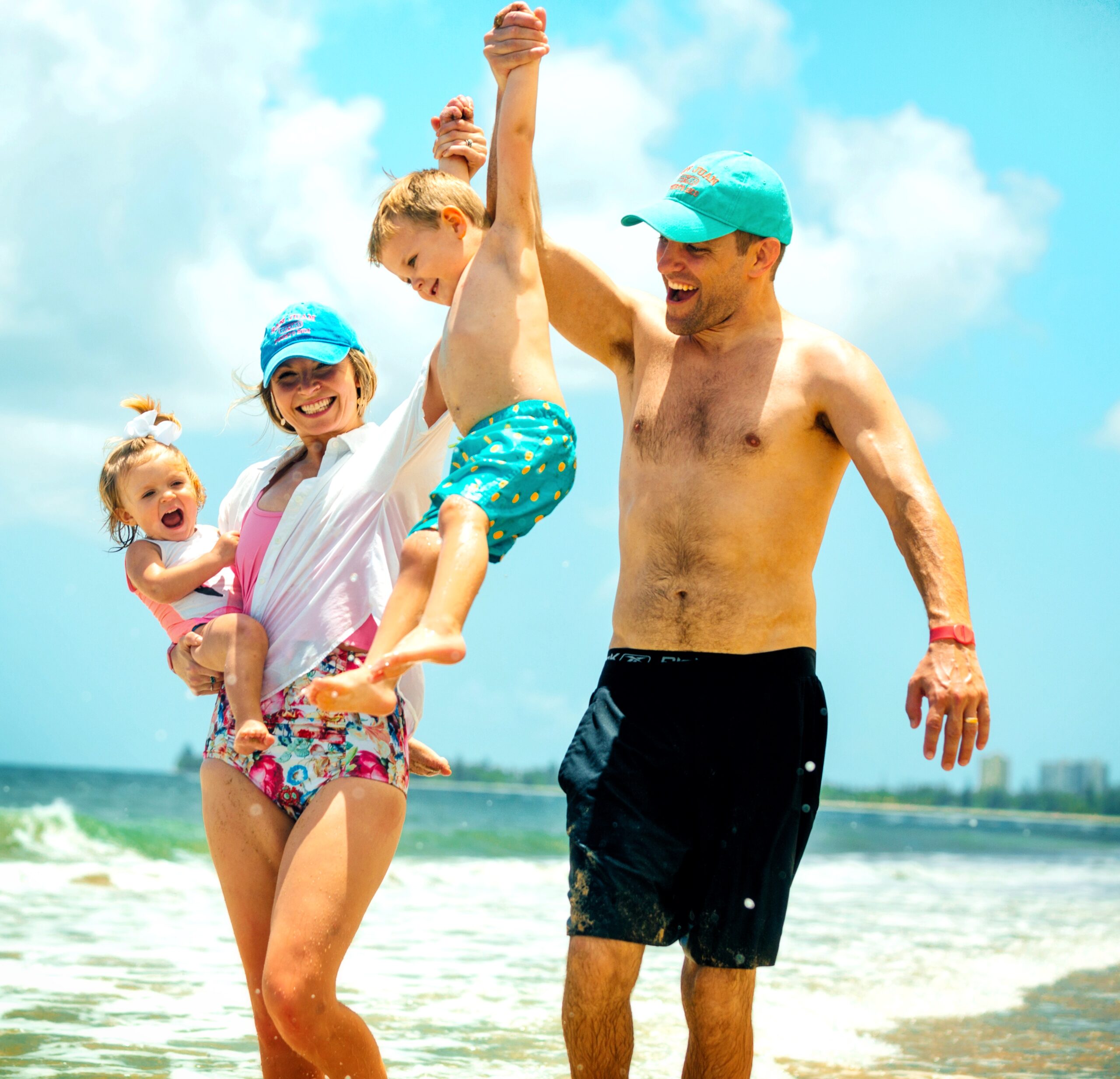 A family with toddlers, staying at the luxurious Condado Vanderbilt Hotel, is captured by their guide and ambassador while enjoying the crystal-clear waters of Poza del Obispo Beach. This vibrant moment is part of Bucketlist Tours' Northern Coastal Adventure Private Tour, a bespoke beach-hopping experience that includes visits to four stunning beaches, such as a unique black sand beach and the picturesque Mar Chiquita Beach, where an exclusive rock formation hike offers breathtaking ocean views. Offered from San Juan, Dorado, and Rio Grande, this tour highlights Bucketlist Tours' dedication to providing safe, comfortable, and culturally immersive luxury travel experiences designed exclusively for American travelers.