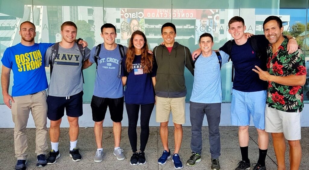 A group of young U.S. Naval Academy officers, beaming with smiles, poses with their Bucketlist Tours guide and ambassador at the airport before departing Puerto Rico. After a memorable four days staying at El Convento Hotel in Old San Juan, they enjoyed Bucketlist Tours' Perfect Beach Escapade: Northern Coastal Adventure, in addition to the Discover Puerto Rico 3-Day Package Private Experience. A testament to seamless planning and attention to detail.