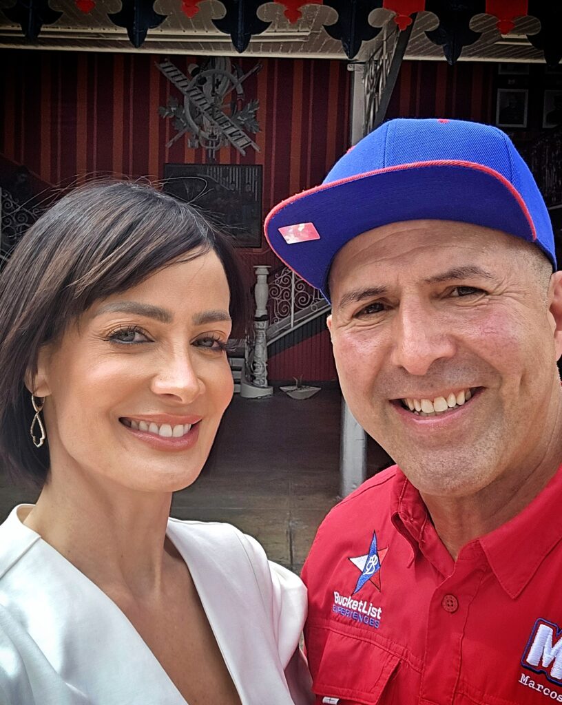 Bucketlist Tours Co-Founder Carlos Alexis, affectionately known as Papito, poses with 1993 Miss Universe Dayanara Torres in front of Puerto Rico's oldest fire station, located in Plaza de La Delicias, Ponce. This candid moment captures Carlos sharing with Dayanara some of Puerto Rico's natural and cultural beauties that reflect her timeless grace and the island’s rich heritage.